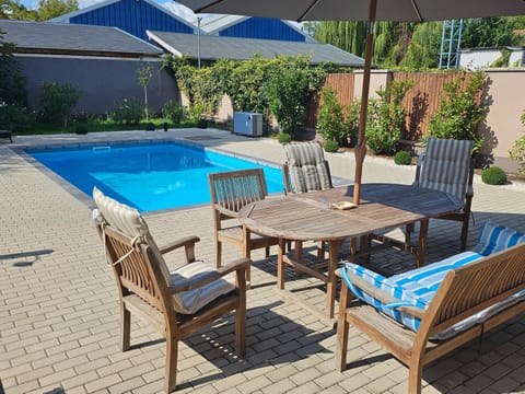 Patio, Day, Garden view, Pool view, Swimming pool, sunbed