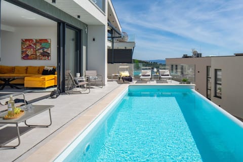 Three-bedroom Villa Sunshine with a heated pool, media room, and views of the sea Villa in Split-Dalmatia County