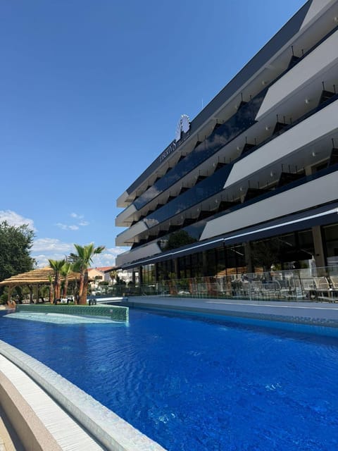 Property building, Restaurant/places to eat, Swimming pool