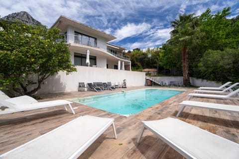 Property building, Living room, Swimming pool