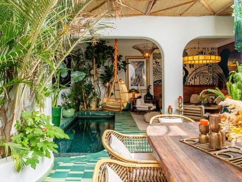 Patio, Living room, Dining area, Pool view