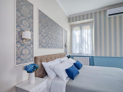 Photo of the whole room, Bedroom, hair dryier, towels