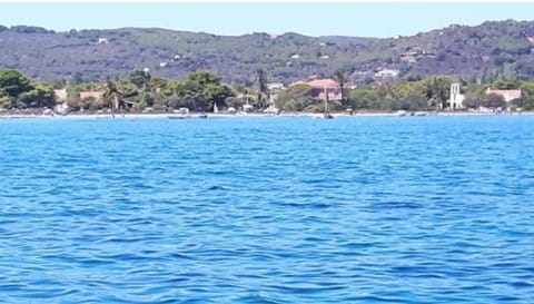 Property building, Day, Natural landscape, Beach, Sea view