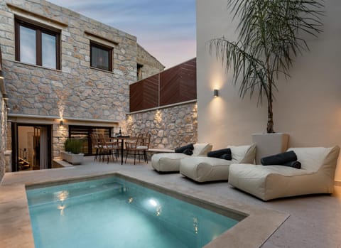 Property building, Patio, Seating area, Pool view, Swimming pool, sunbed