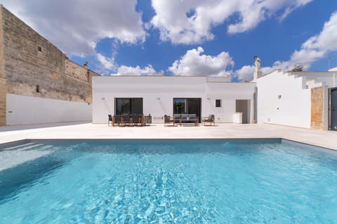 Property building, Patio, Day, Pool view, Swimming pool