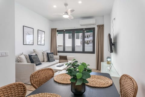 Living room, Dining area, fireplace, air conditioner