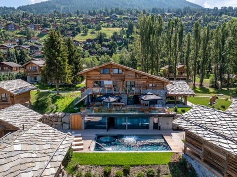 Property building, Natural landscape, Bird's eye view, Mountain view, Pool view