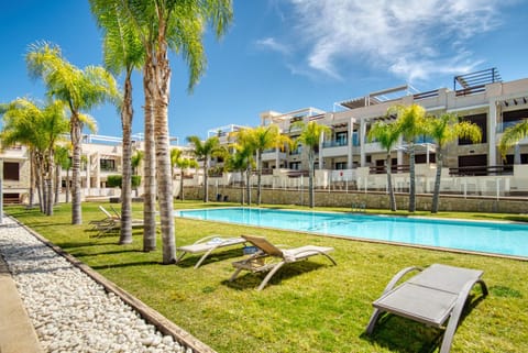 Property building, Living room, Swimming pool