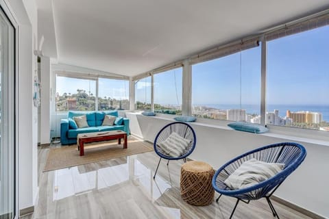 Natural landscape, View (from property/room), Living room, Seating area, Sea view