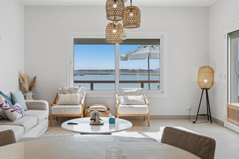 Natural landscape, Living room, Seating area, Dining area, Sea view