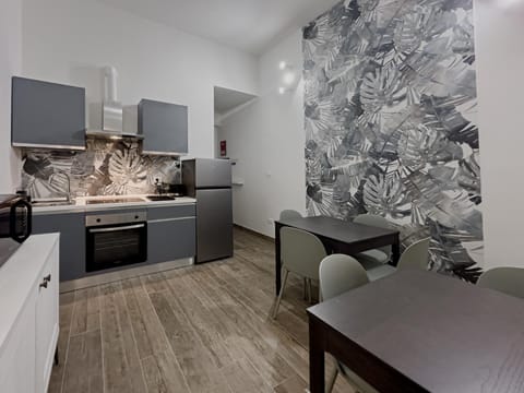 Kitchen or kitchenette, Living room, Seating area, Dining area, stove