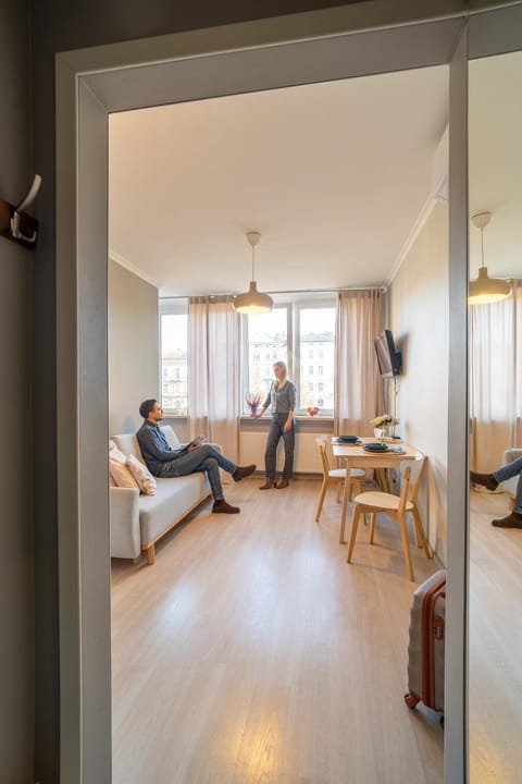 People, TV and multimedia, Living room, Seating area, group of guests