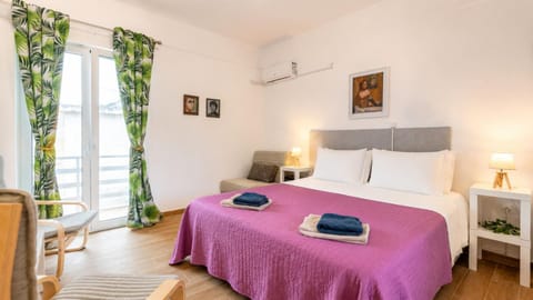 Bed, Photo of the whole room, Bedroom, towels, air conditioner