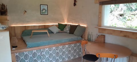 Bed, Living room, Seating area, Bedroom