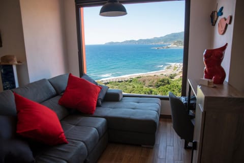 Natural landscape, Living room, Seating area, Sea view