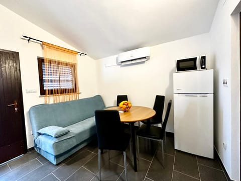 Living room, Seating area, Dining area, minibar, air conditioner