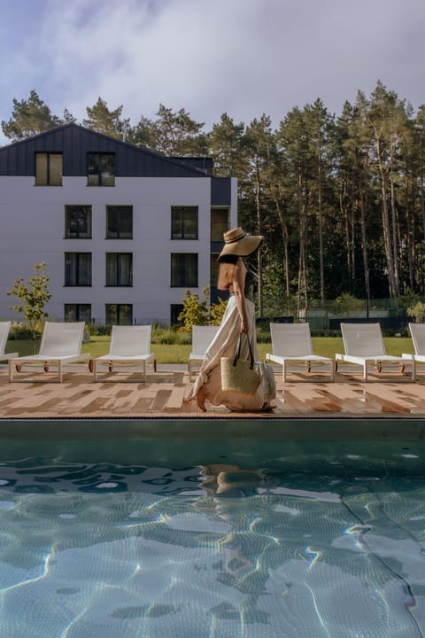 Property building, Natural landscape, Pool view, Swimming pool, sunbed