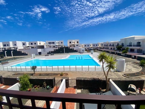 View (from property/room), Balcony/Terrace, Pool view, Swimming pool, sunbed