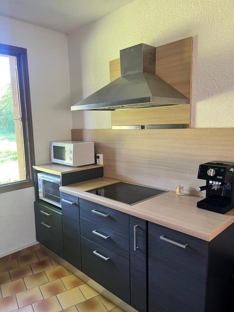 Kitchen or kitchenette, stove, toaster