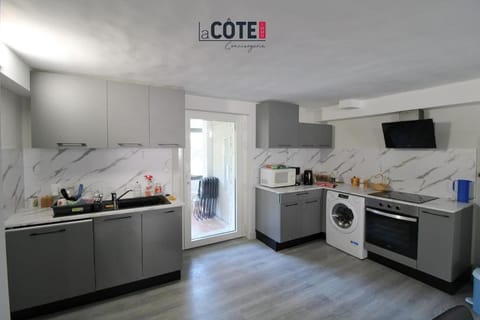 Kitchen or kitchenette, dishwasher, oven, stove, toaster