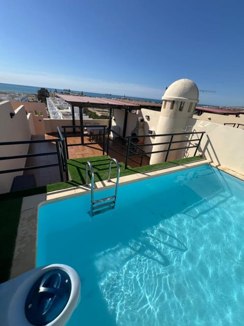 View (from property/room), Sea view, Swimming pool, sunbed