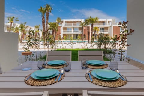 Property building, Patio, Day, Garden, View (from property/room), Balcony/Terrace, Dining area, Garden view, Pool view, Swimming pool