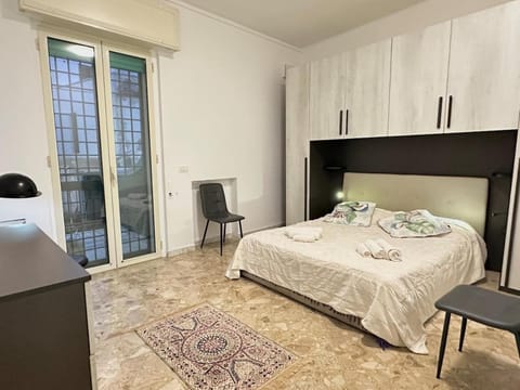 Bed, Photo of the whole room, Bedroom, towels, wardrobe
