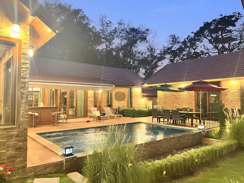 Property building, Seating area, Dining area, Pool view, Swimming pool