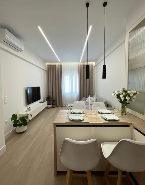 TV and multimedia, Living room, Photo of the whole room, Seating area, Dining area, air conditioner