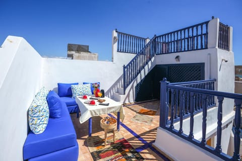 Property building, Patio, Day, View (from property/room), Balcony/Terrace, Living room, Seating area, Dining area