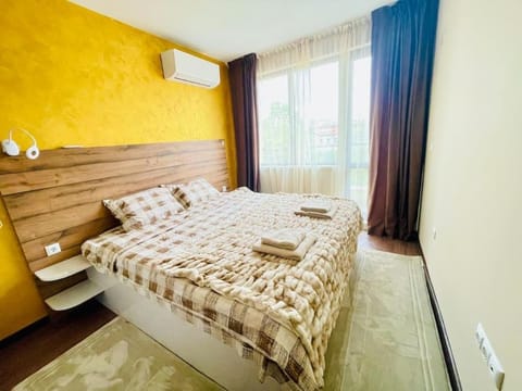 Bed, Photo of the whole room, Bedroom, towels, air conditioner