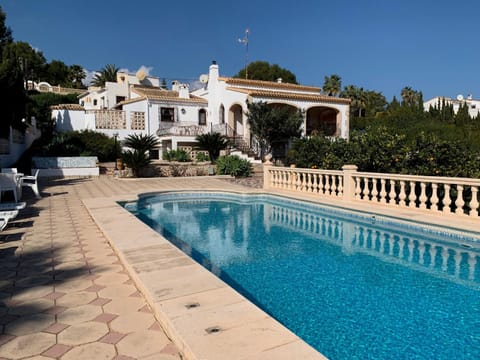 Property building, Living room, Swimming pool