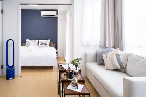 Bed, Living room, Seating area, Bedroom, air conditioner