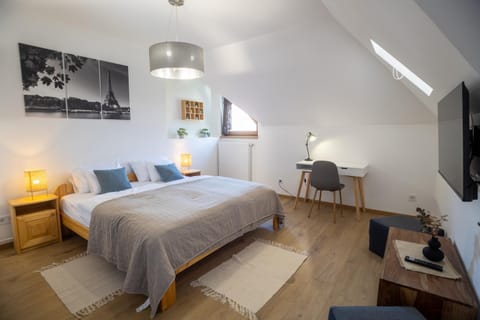 Bed, TV and multimedia, Seating area, Bedroom, hair dresser