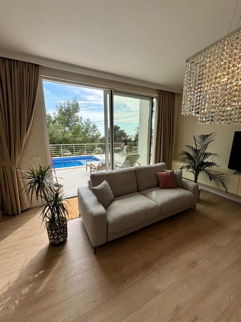 Living room, Seating area, Pool view, Swimming pool