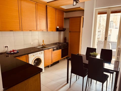 Dining area, dishwasher, oven, stove, washing machine