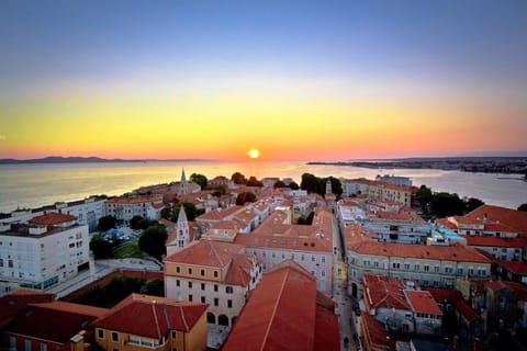 Nearby landmark, Day, Natural landscape, Bird's eye view, City view, Sea view, Location, Sunset