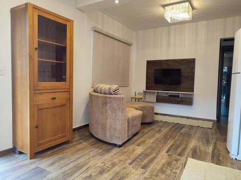 Communal lounge/ TV room, Bed, TV and multimedia, Living room, Photo of the whole room, Seating area, Evening entertainment, Bedroom, wardrobe