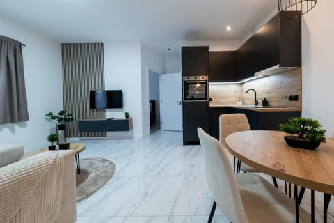 TV and multimedia, Kitchen or kitchenette, Living room, Seating area, Dining area, oven, stove