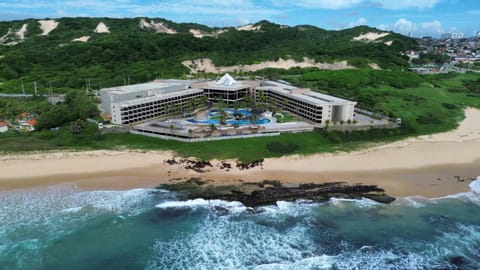 Property building, Natural landscape, Bird's eye view, Beach, Aqua park, Mountain view, Sea view, Swimming pool