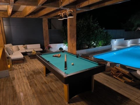 Patio, Billiard, Seating area, Swimming pool