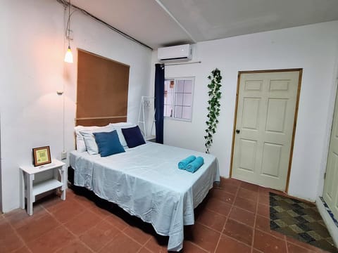 Bed, Photo of the whole room, Bedroom, towels, air conditioner