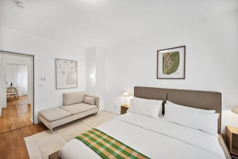 Bed, Living room, Seating area, Bedroom