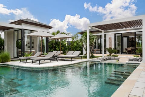 Property building, Seating area, Pool view, Swimming pool, sunbed