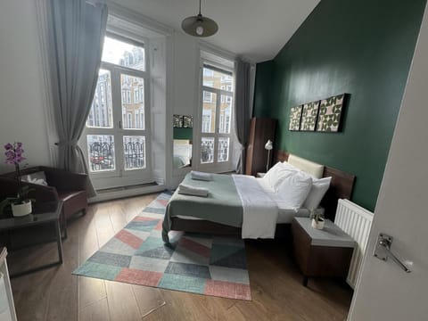 Bed, Decorative detail, Seating area, Bedroom, heating, towels