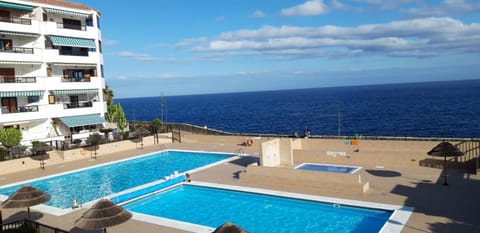 Property building, Day, Natural landscape, View (from property/room), Balcony/Terrace, Pool view, Sea view, Swimming pool