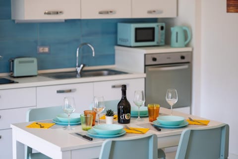 Kitchen or kitchenette, Dining area, oven, stove, toaster