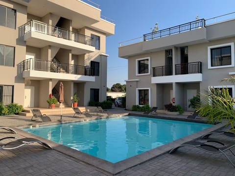 Property building, Day, Balcony/Terrace, Pool view, Swimming pool, sunbed