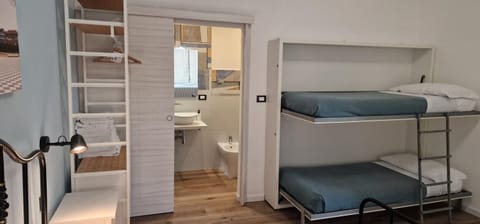 Toilet, Bed, Bathroom, Photo of the whole room, Bedroom, bunk bed, towels