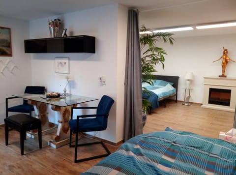 Bed, Seating area, Dining area, Bedroom